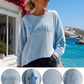 Yippie Hippie Damen Sweatshirt „Seaside“ – Oversize Pullover in Hellblau mit Print & Pailletten