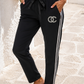 Damen Jogpants Schwarz mit Glitzersteinen & Seitenstreifen – Baumwolle Elasthan 38–42