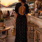 Elegant viscose dress in black with gold embroidery