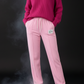 Roze combinatieset bestaande uit een t-shirt en een broek, maten 38-42+