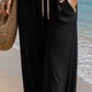 Palazzo Hose Schwarz Gold – 100% Viskose | Weite Sommerhose mit Gold-Details | 38–42