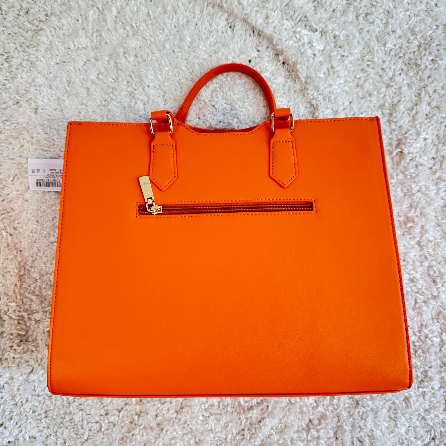 Leuchtend orangefarbenen Handtasche