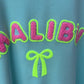 Damen Malibu Sweatshirt Türkis – Kurzarm Baumwollshirt mit Neon Print | Sommer Shirt 38–42 🌴💙☀️